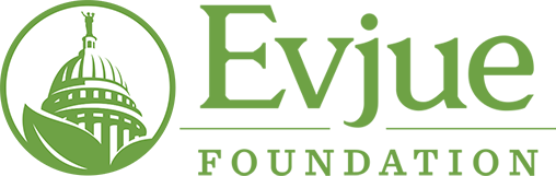 Green logo in serif script that says "Evjue Foundation." On the left is an image of the Madison, WI Capitol in green with a leaf in front of it.