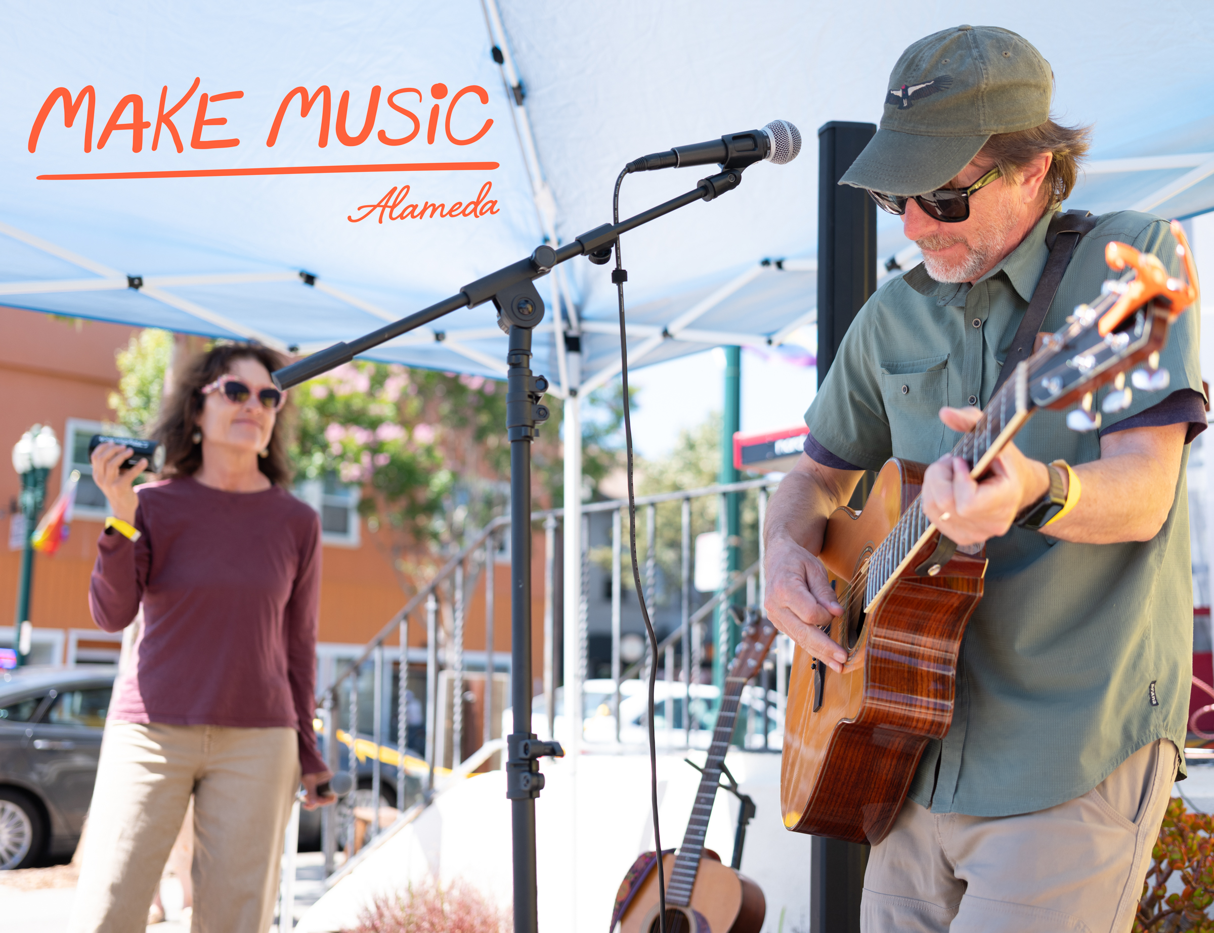 Bay Station Duo perform at Douglas Despres Photography in the parking lot. Photo by Douglas Despres